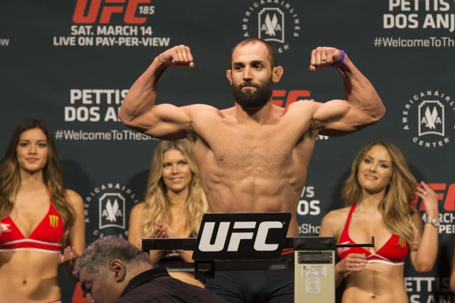 Johny Hendricks In Front Of Ring Girls Wallpaper