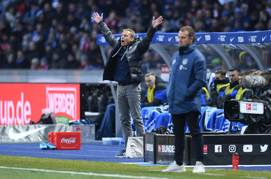 Jurgen Klinsmann Raising Arms Wallpaper