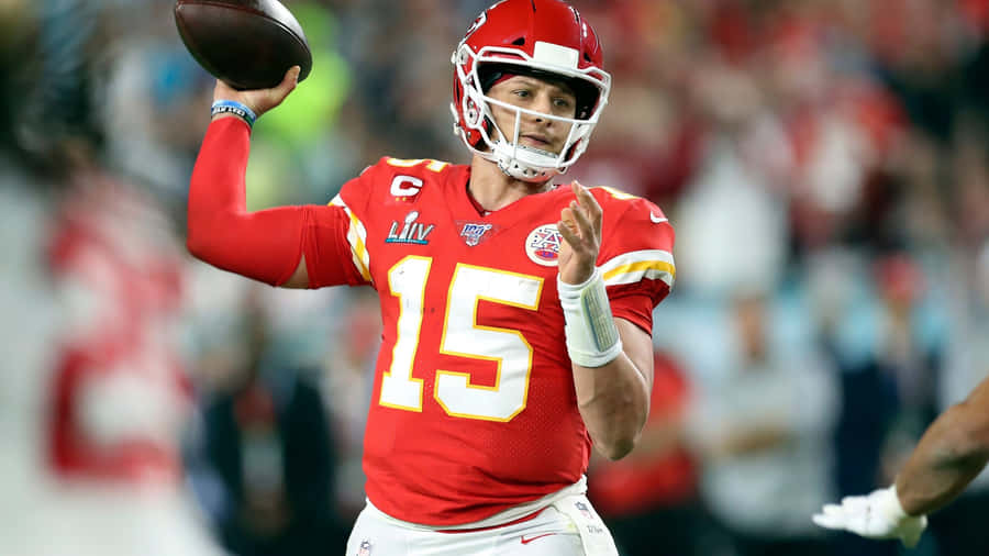 Kansas Chiefs Quarterback Tyrod Thomas Throwing The Ball Wallpaper