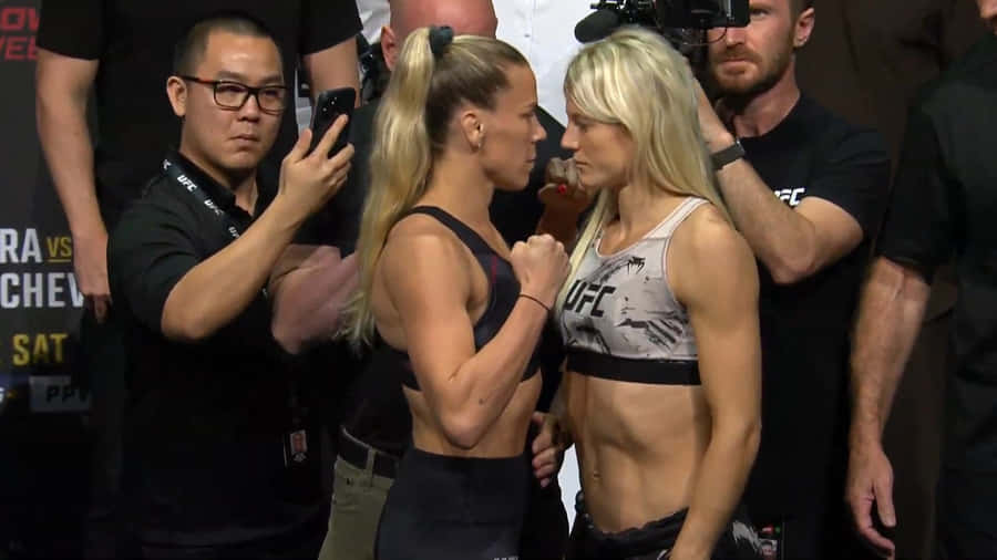 Katlyn Chookagian Intense Face-off Wallpaper