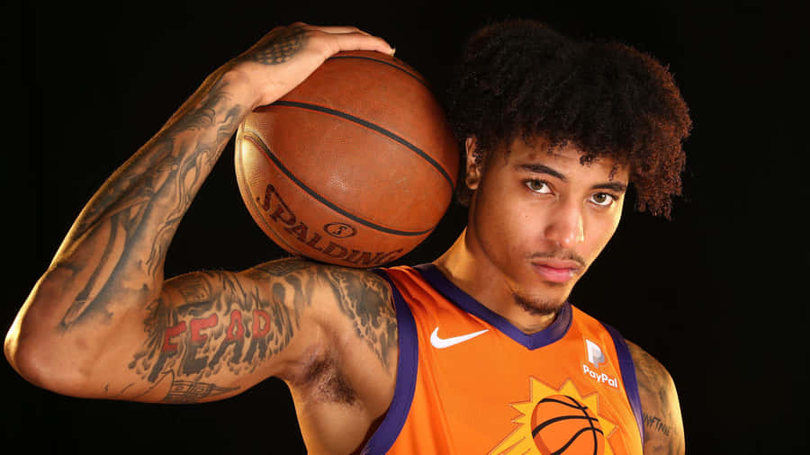 Kelly Oubre Jr Poses For The Camera Wallpaper