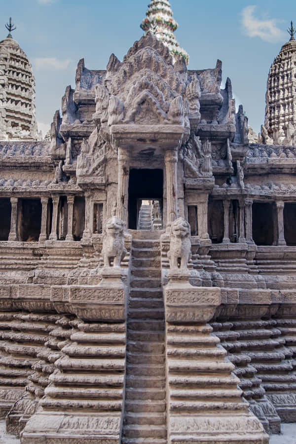 Majestic Pathway To Angkor Thom Temple Wallpaper