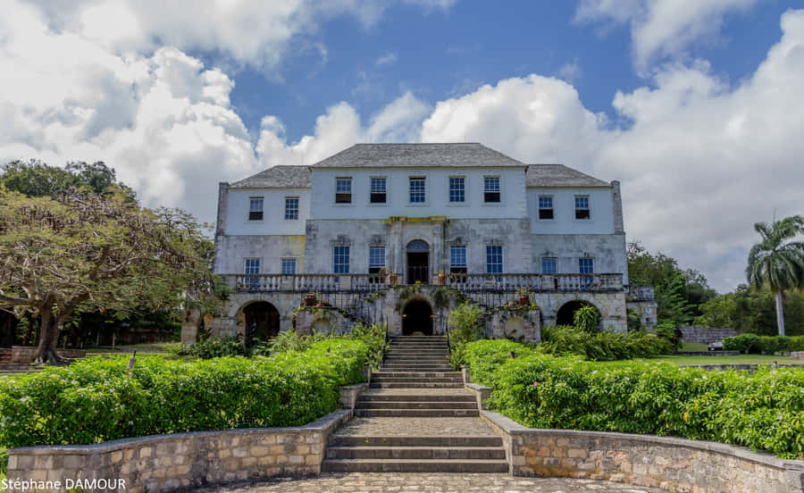 Majestic Rose Hall Great House Under The Clear Blue Sky Wallpaper