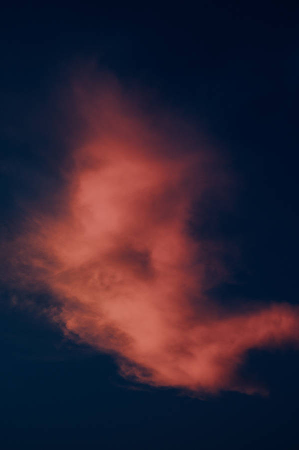 Majestic Sepia-colored Clouds In Gloomy Skies Wallpaper