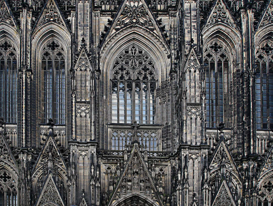 Majestic View Of Cologne Cathedral With Gothic Architecture Wallpaper