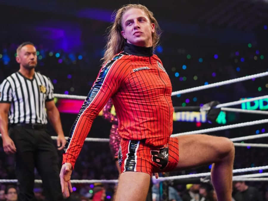 Matt Riddle In Red Wrestling Costume Wallpaper