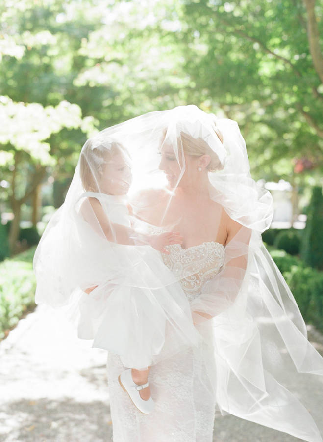 Mother And Daughter Under A Veil Wallpaper