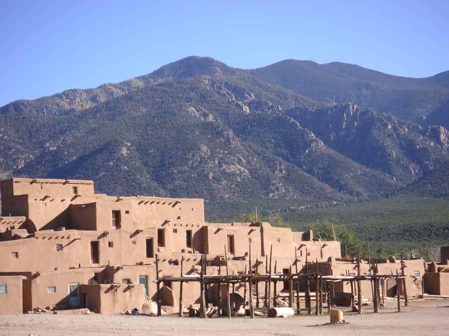 Multilevel Adobe Dwellings In Taos Pueblo Wallpaper