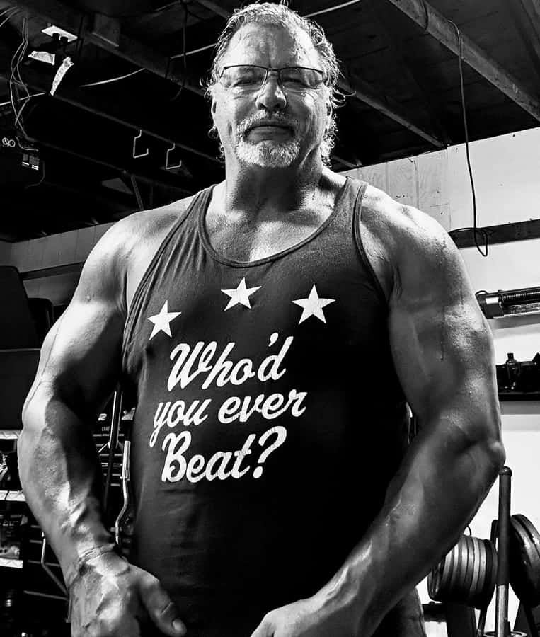 Muscular Manin Gym Tank Top Wallpaper