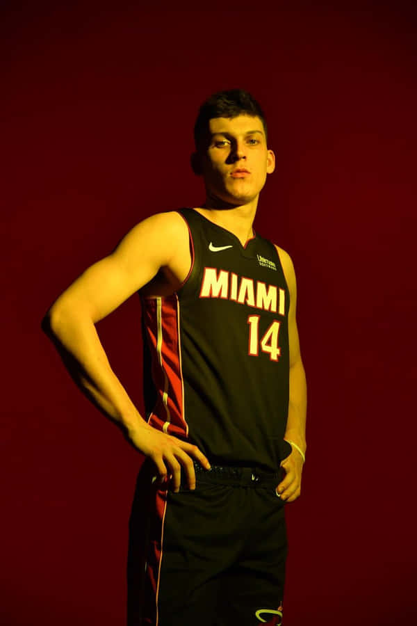 Nba Draft Pick And Miami Heat Star Tyler Herro In Action Wallpaper