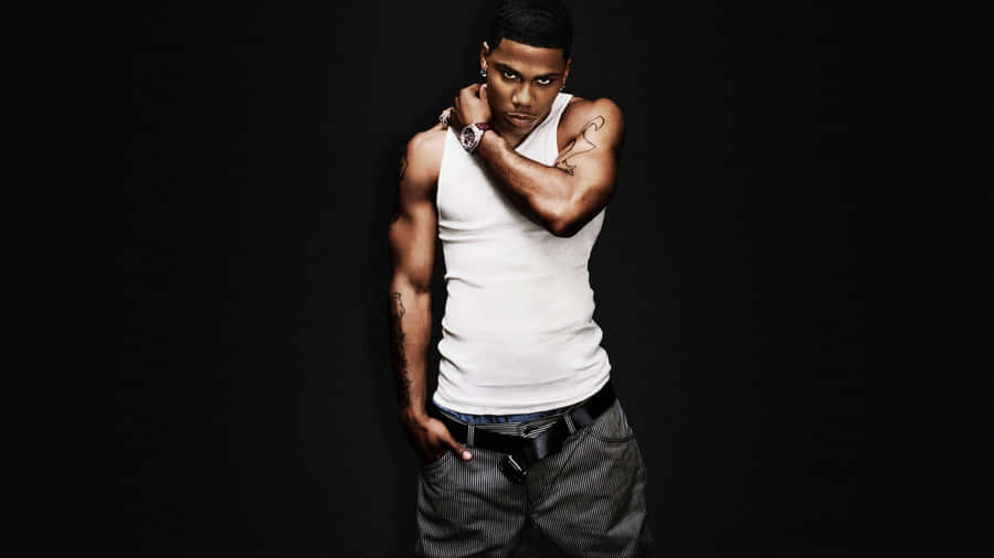 Nelly Posing With A Fierce Expression Wallpaper