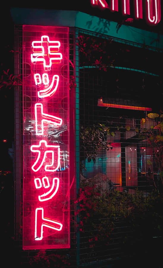 Neon Lights Of Japan - A Showcase Of The Country's Vibrant Night Life Wallpaper