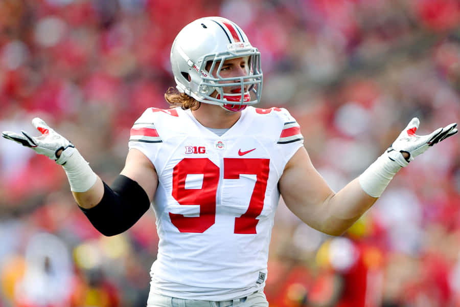 Nick Bosa Ready For Action In The 49ers' Red And Gold Wallpaper