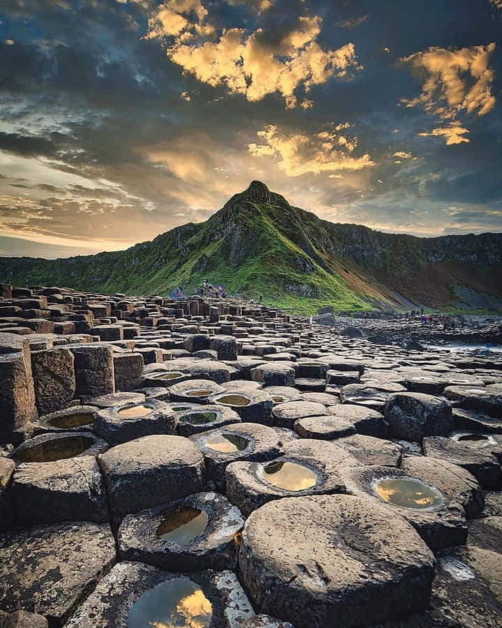 Northern Ireland Giant's Causeway Dark Thick Clouds Wallpaper