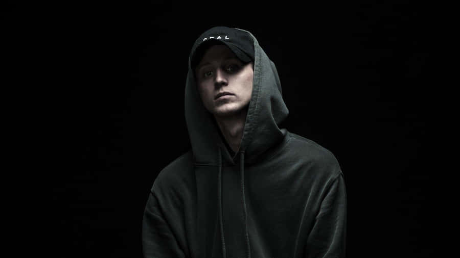 Passionate Performance By Nf Rapper Wallpaper