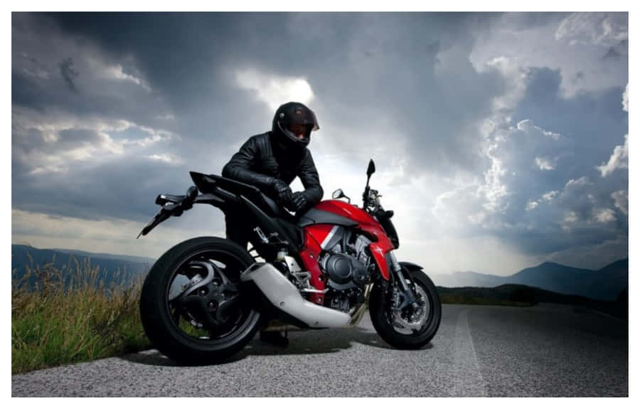 Picture Perfect Ride: Rev Up Your Soul With This Amazing Motorcycle And Enjoy The Ride Of A Lifetime. Wallpaper