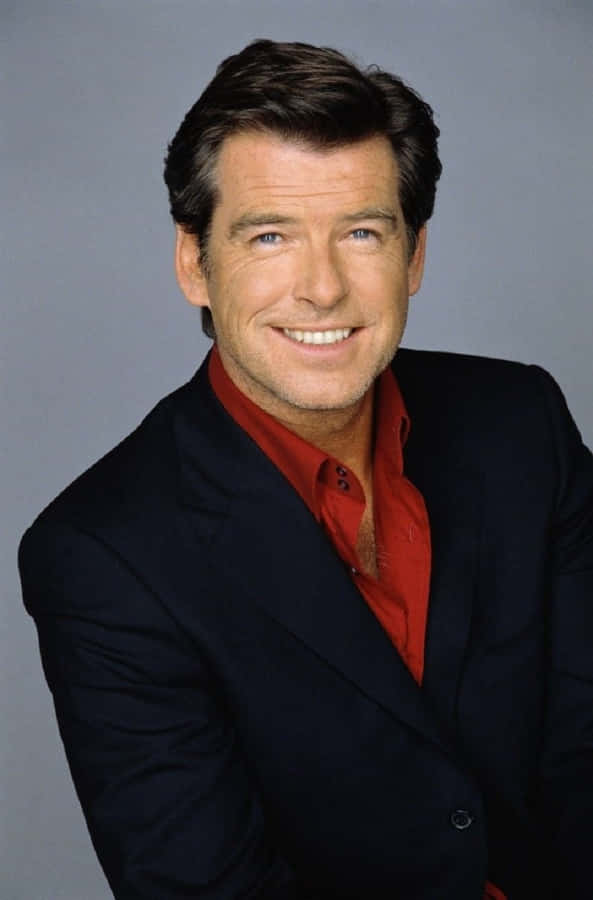 Pierce Brosnan Charming In A Tuxedo Wallpaper