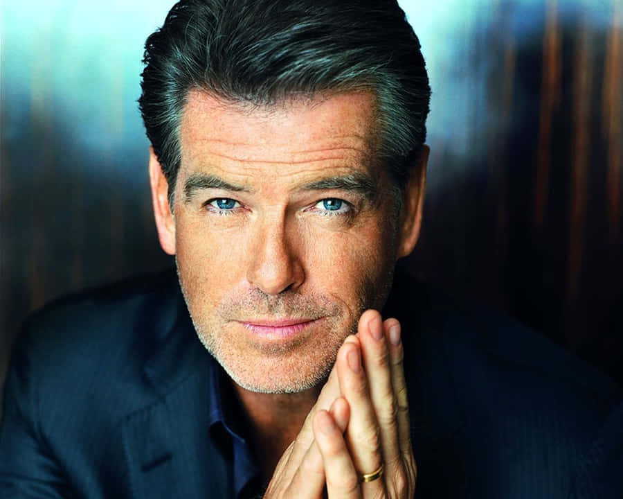 Pierce Brosnan Smiling During Cannes Film Festival Wallpaper