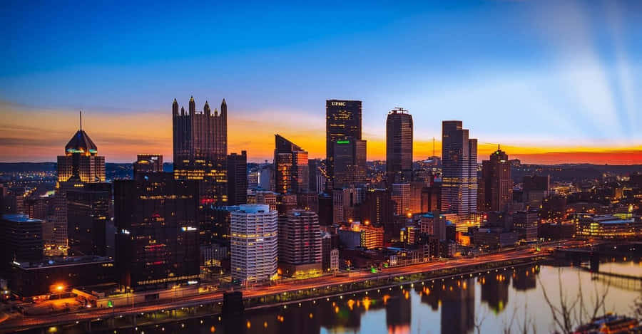 Pittsburgh Skyline Glowing Auburn Wallpaper