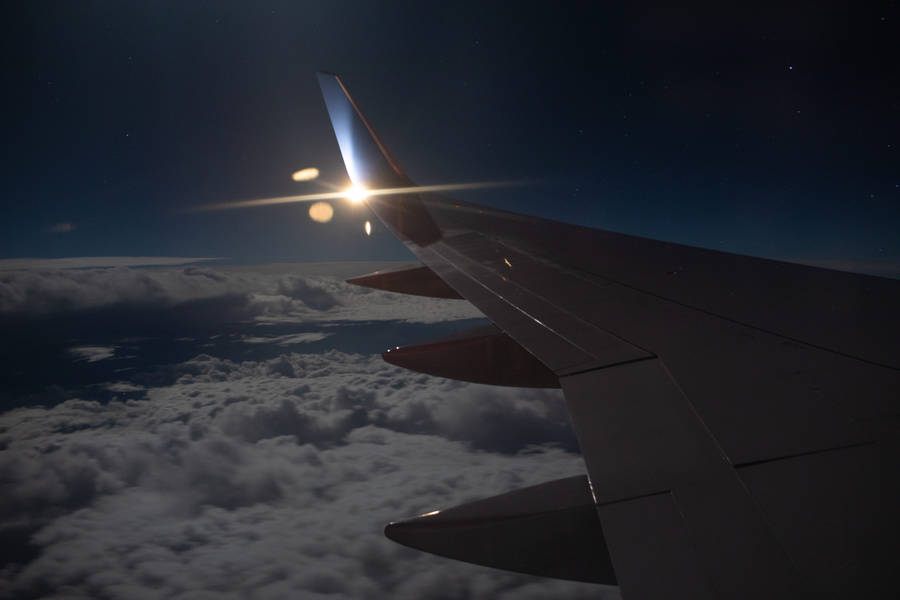 Plane Window Night Sight Wallpaper