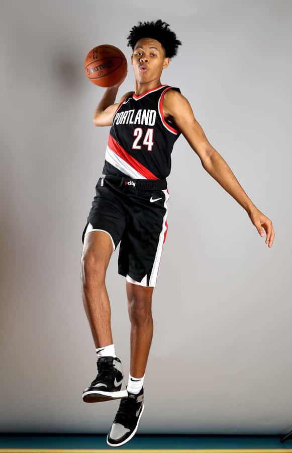 Portland Basketball Player Mid Air Pose Wallpaper