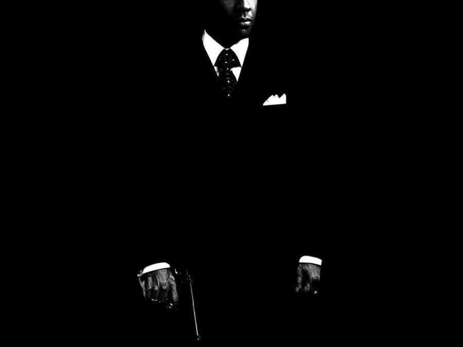 Power And Prestige: Dressing Like A Black Gangster Wallpaper