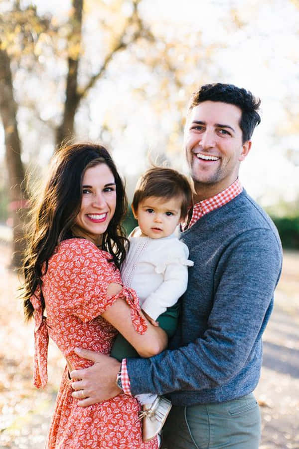Radiating Love: Marvelous Family Portrait Wallpaper