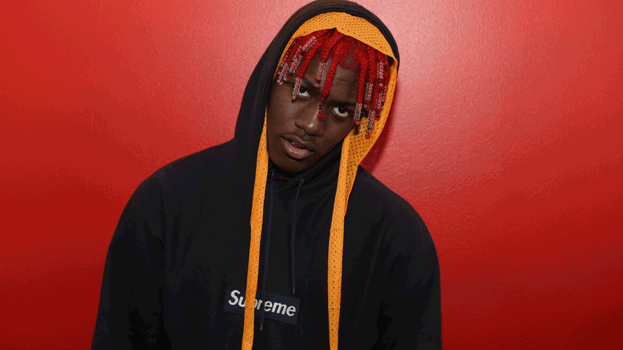 Rapper Lil Yatchy Posing For The Camera Wallpaper