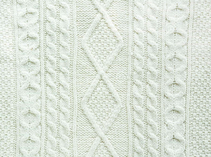Recurring Diamond Pattern White Knit Sweater Wallpaper