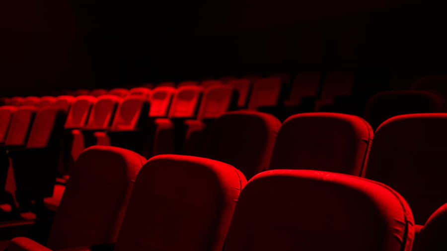 Red Audience Chairs Of A Theater Wallpaper