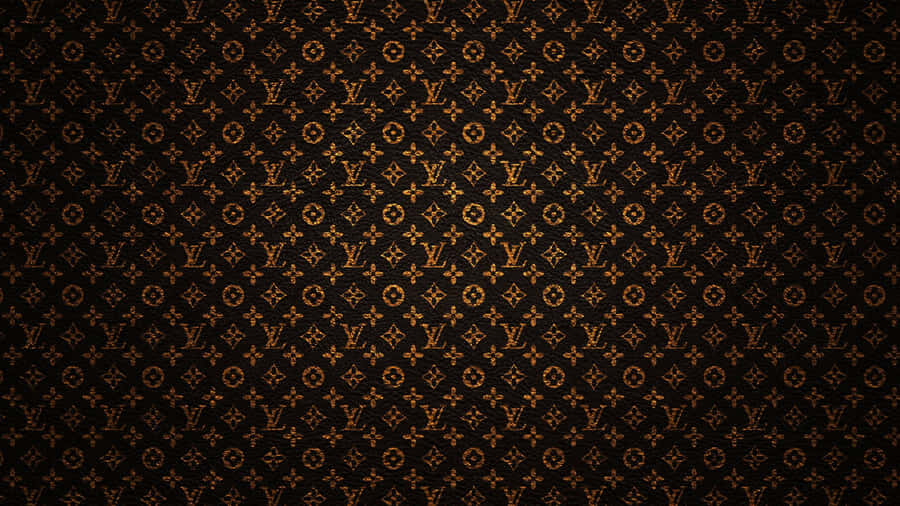 Refined And Elegant Black And Gold Desktop Setup Wallpaper