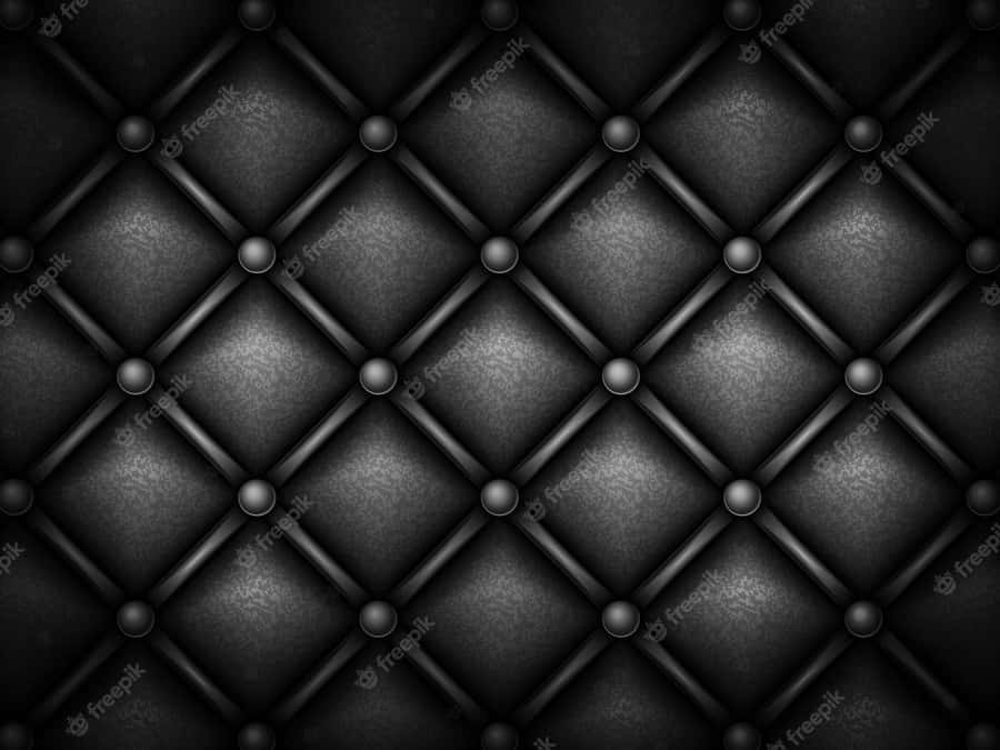 Rich And Supple, Enjoy The Luxurious Comfort Of Black Leather Wallpaper