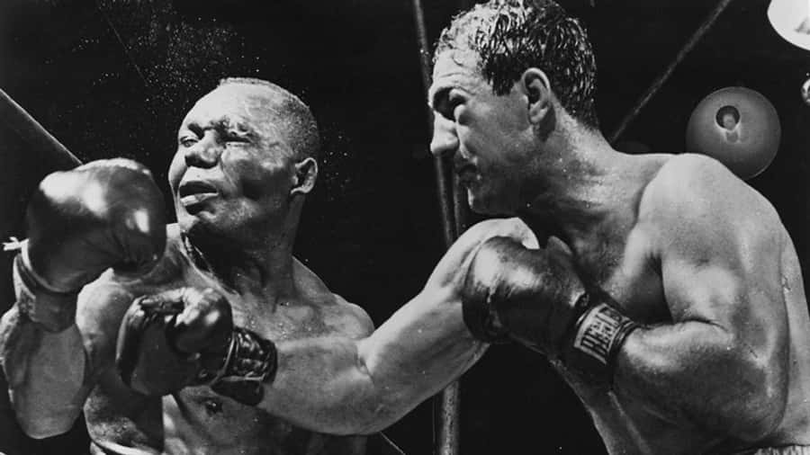 Rocky Marciano Stunning Victory Over Jersey Joe Walcott Wallpaper