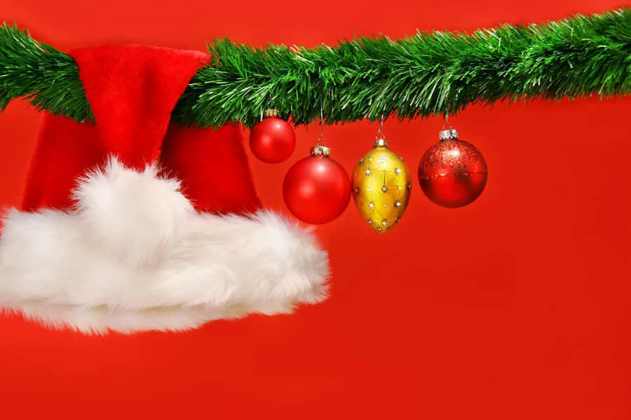 Santa Hat Red And Green Christmas Wallpaper