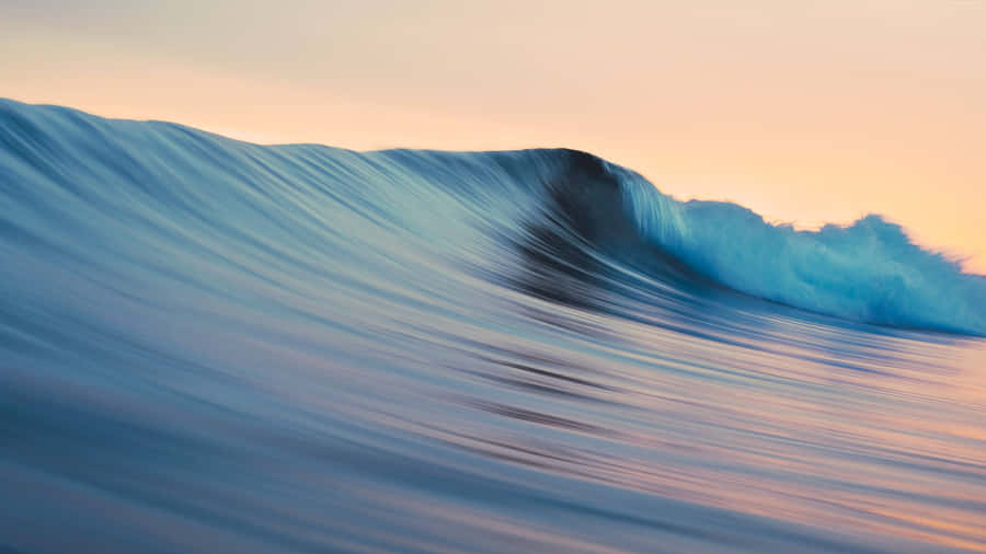 Serene_ Ocean_ Wave_at_ Twilight.jpg Wallpaper