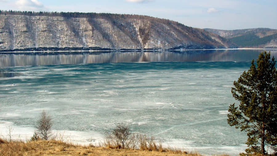Serene View Of Lake Baikal - The Deepest Lake In The World Wallpaper
