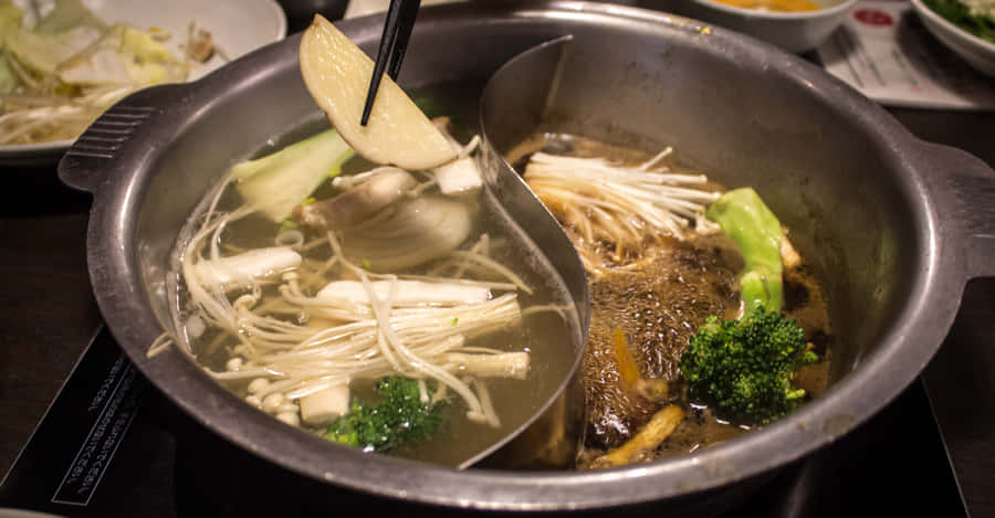 Shabu-shabu In A Dual Stainless Steel Hot Pot Wallpaper