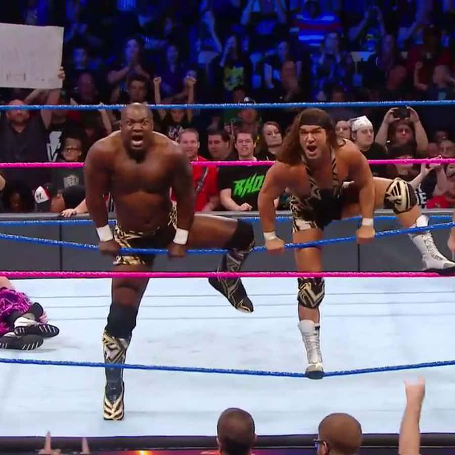 Shelton Benjamin And Chad Gable In The Heat Of A Fatal 4-way Match Wallpaper