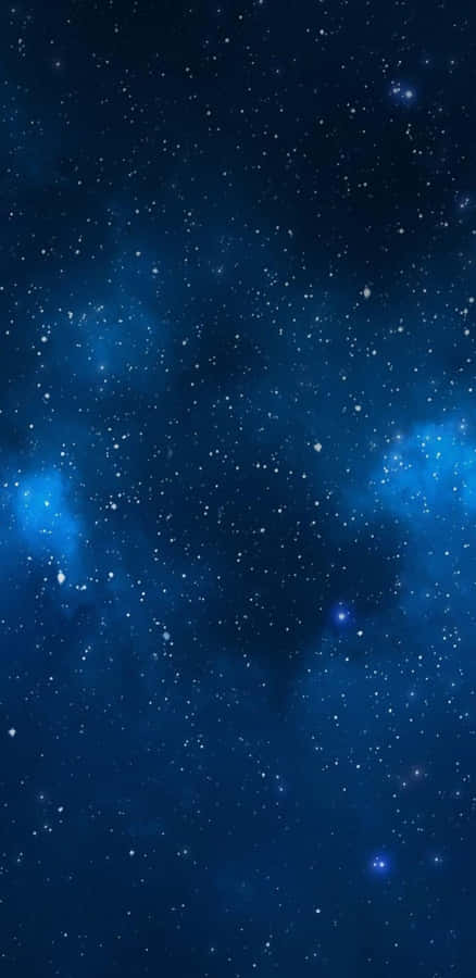 Shining Bright In The Night Sky, Experience The Beauty Of Blue Stars. Wallpaper