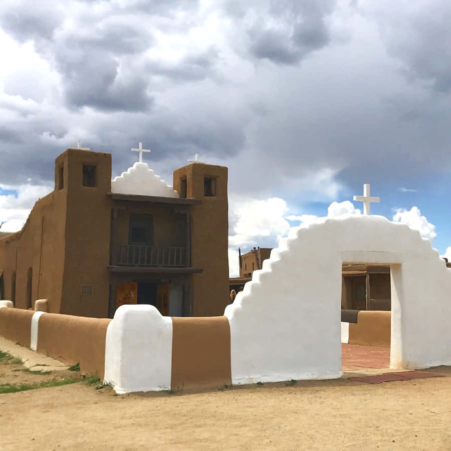 Side View Of San Geronimo Chapel In Taos Pueblo Wallpaper