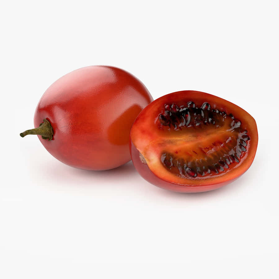 Simple Sliced And Unsliced Tamarillo Tropical Fruit Wallpaper