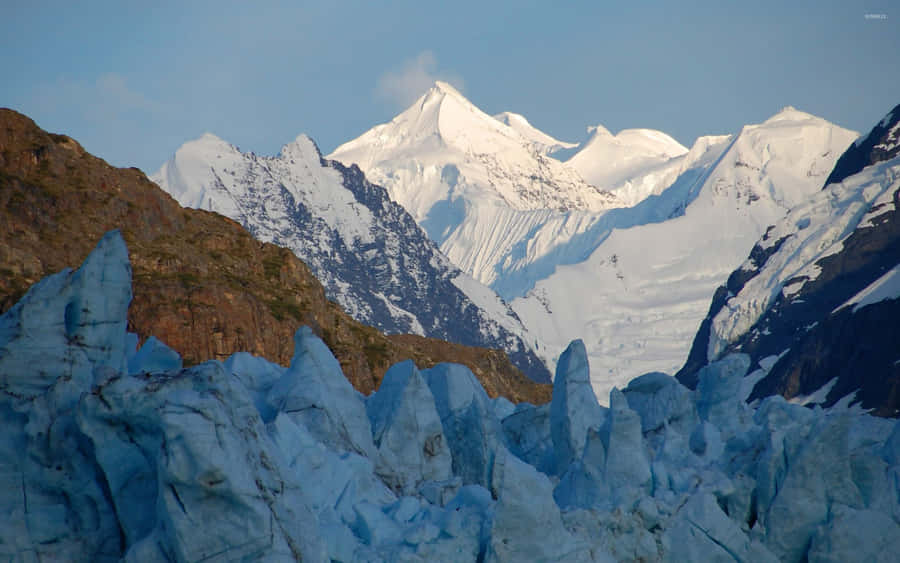 Snowy And Icy Mountain In Glacier Bay National Park Wallpaper