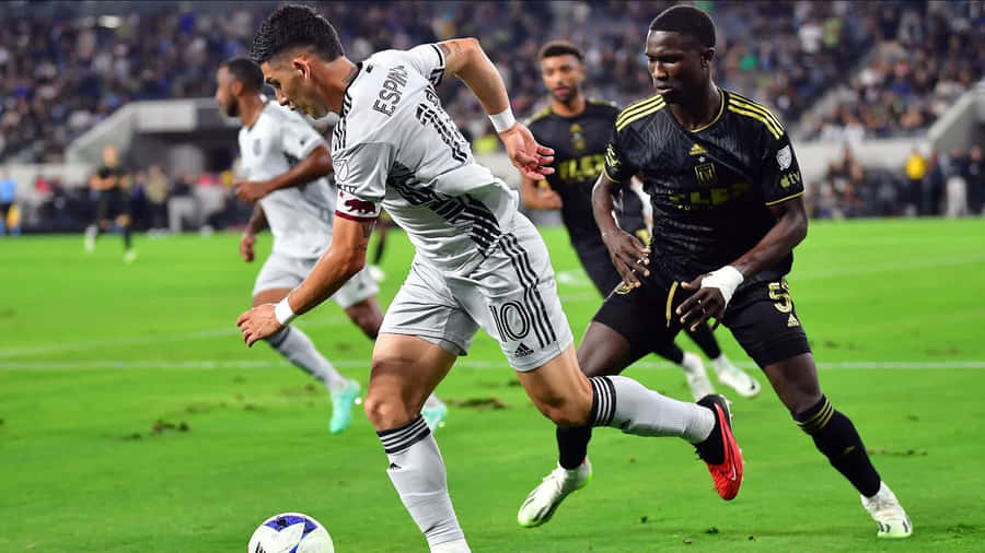 Soccer Action Cristian Espinoza Dribbling Wallpaper