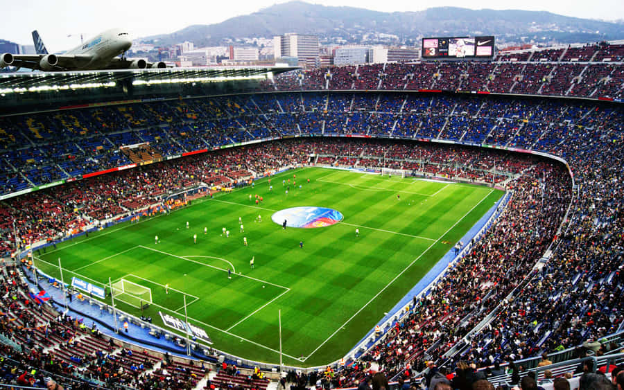 Soccer Fans Cheering In The Stadium. Wallpaper
