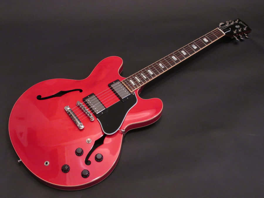Sophisticated Looks And Sweet Sounds – The Gibson 335 Wallpaper