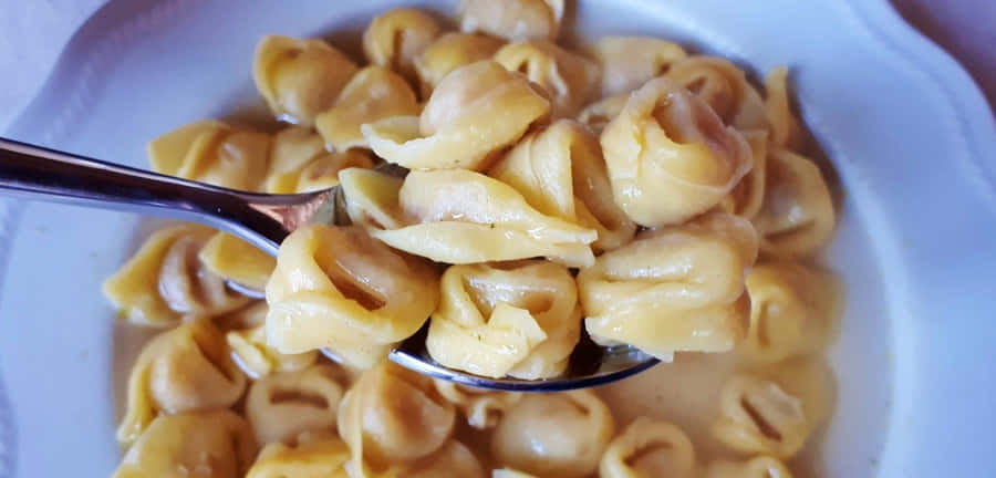 Spoonful Of Tortellini In Brodo Wallpaper