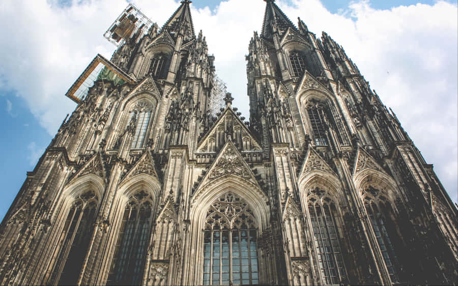 Stunning View Of The Facade Of Cologne Cathedral Wallpaper
