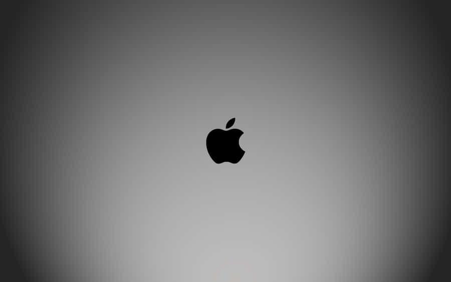 Stylish Black Macbook For The Everyday User Wallpaper