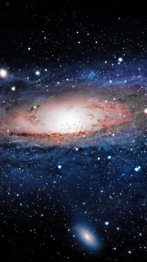 Take A Journey Through Space And Time With This Stunning View Of A Beautiful Galaxy Wallpaper