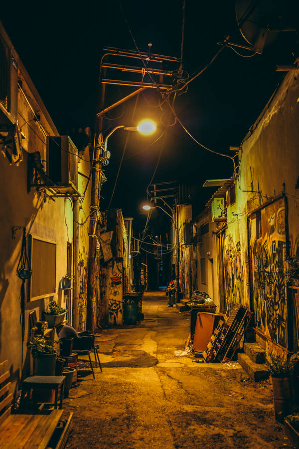Take A Walk Down The Illuminated Street Wallpaper